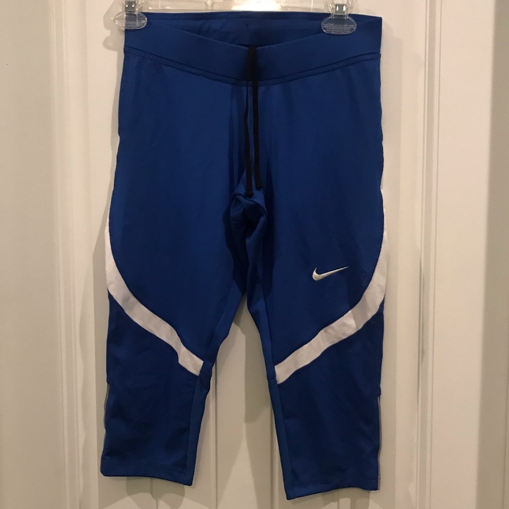Blue Nike capris.